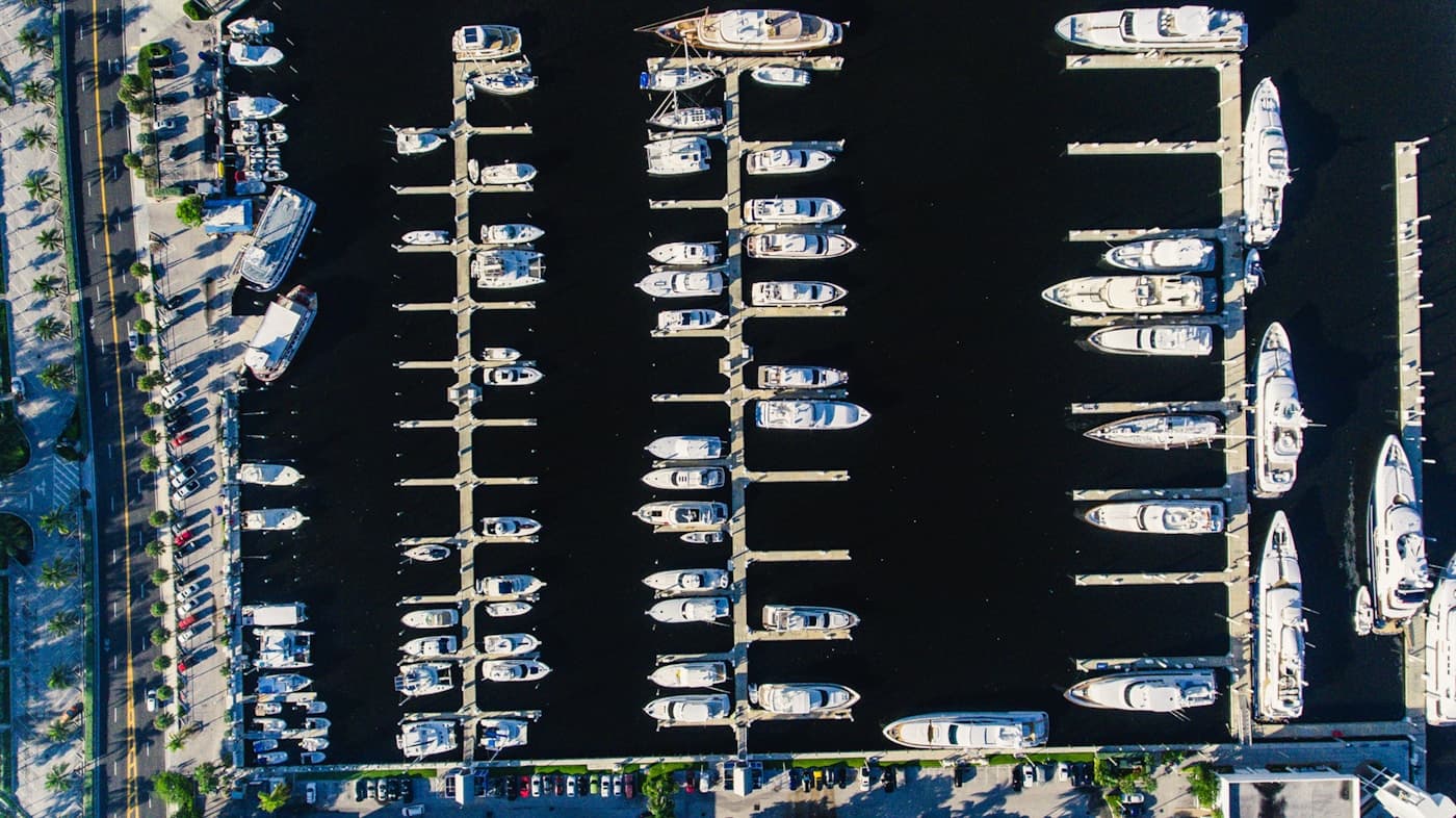 An aerial view of boats moored along a Fort Lauderdale dock.